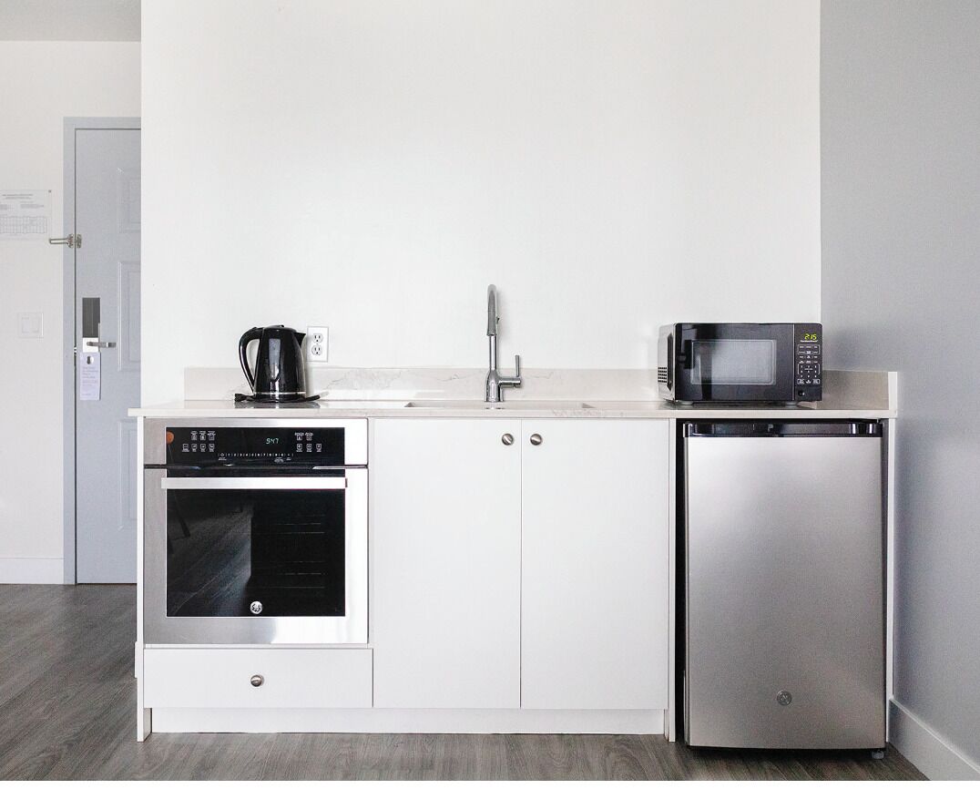 Coffee/tea maker, fridge, microwave, freezer