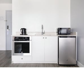 Coffee/tea maker, fridge, microwave, freezer