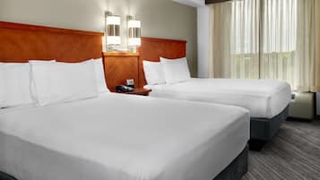Premium bedding, down comforters, in-room safe, desk