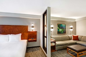 Premium bedding, desk, laptop workspace, blackout curtains