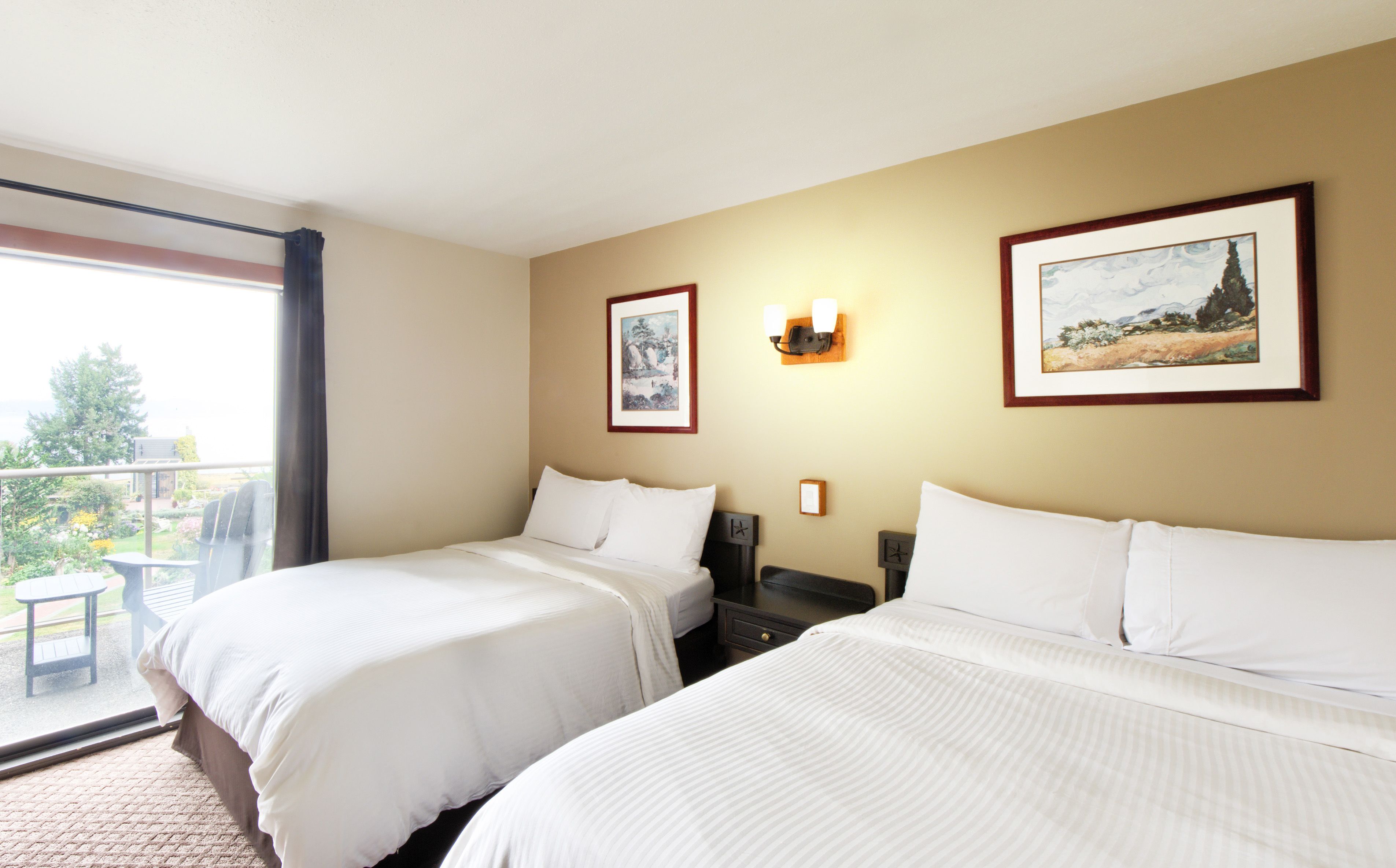 standard room, partial ocean view, garden area | premium bedding, in-room safe, laptop workspace, iron/ironing board