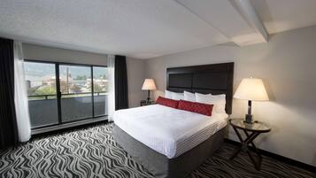 Premium bedding, Select Comfort beds, laptop workspace, blackout drapes