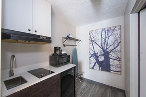 Fridge, microwave, coffee/tea maker, paper towels