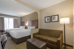 Suite, Multiple Beds, Non Smoking | Desk, laptop workspace, blackout drapes, iron/ironing board