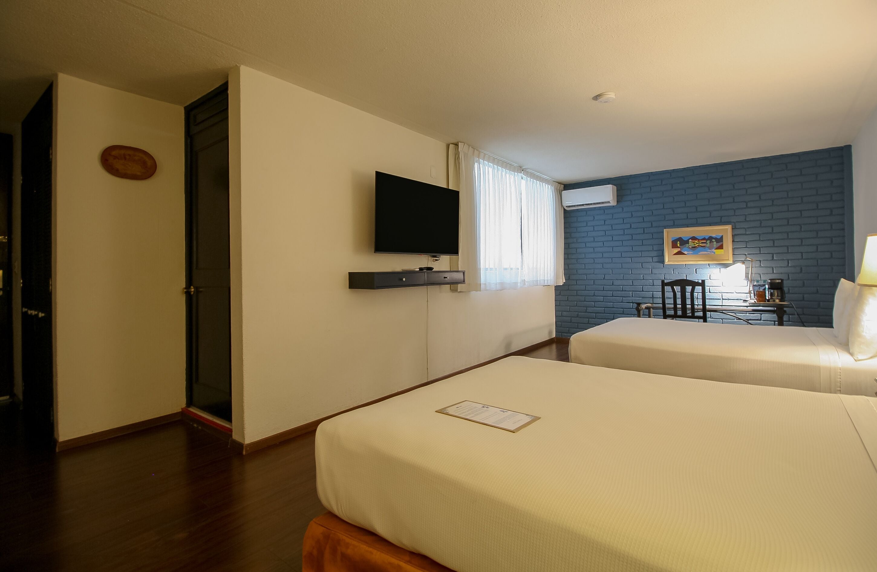 Standaard tweepersoonskamer, 2 tweepersoonsbedden | Luxe beddengoed, een bureau, verduisterende gordijnen