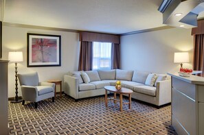 Premium bedding, pillow-top beds, desk, laptop workspace