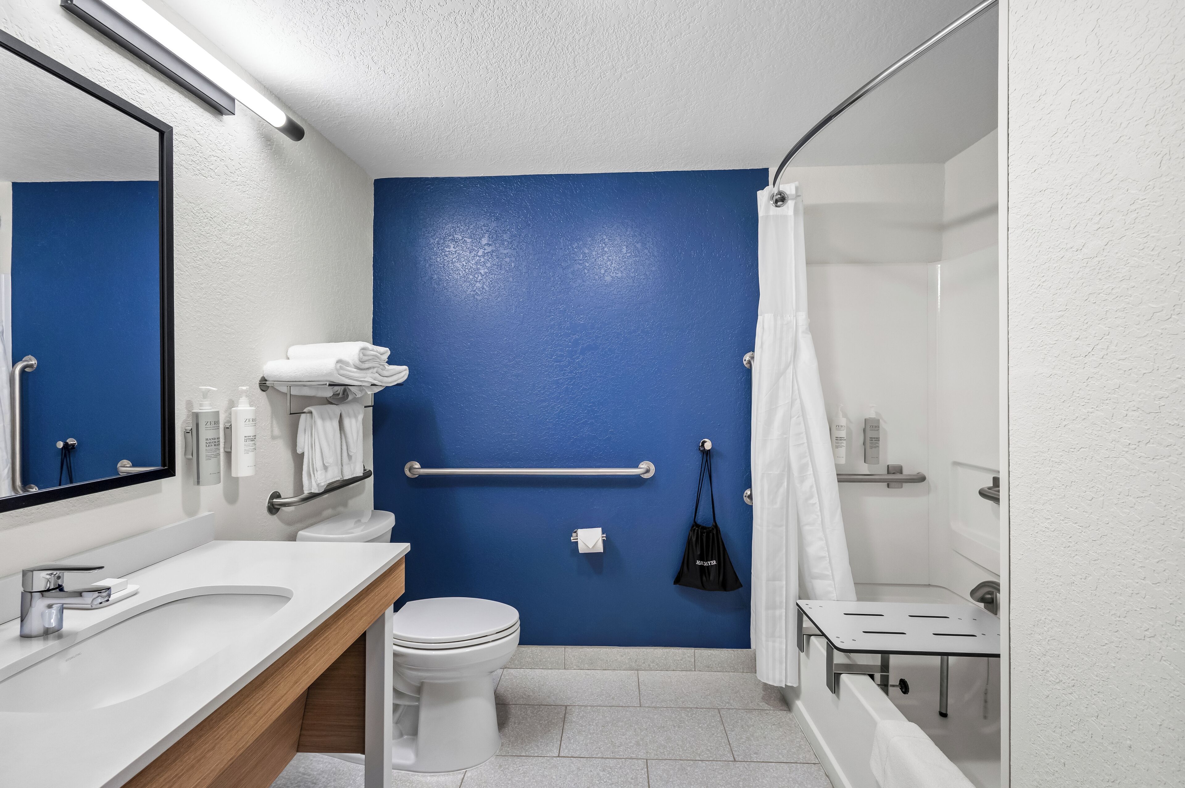 room, 1 king bed, accessible, bathtub (mobility) | bathroom | combined shower/bathtub, free toiletries, hair dryer, towels