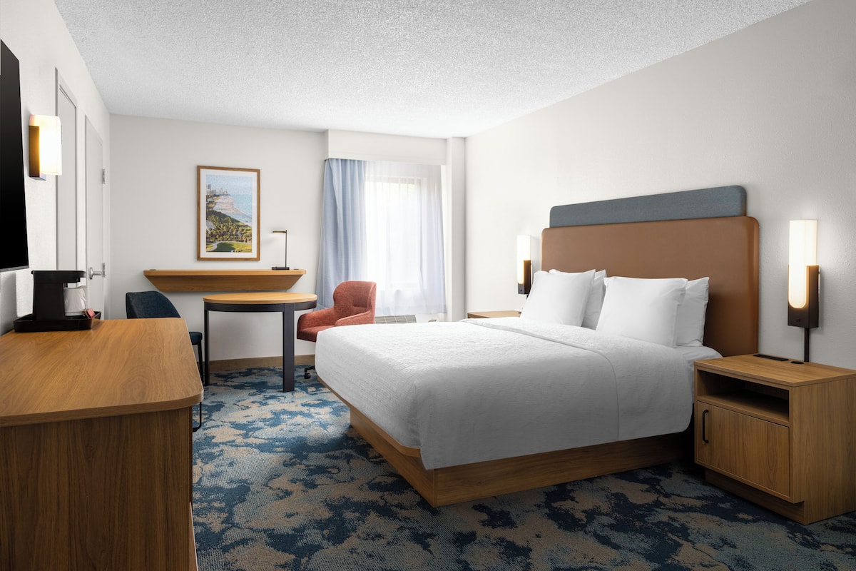 premium bedding, pillow-top beds, desk, laptop workspace