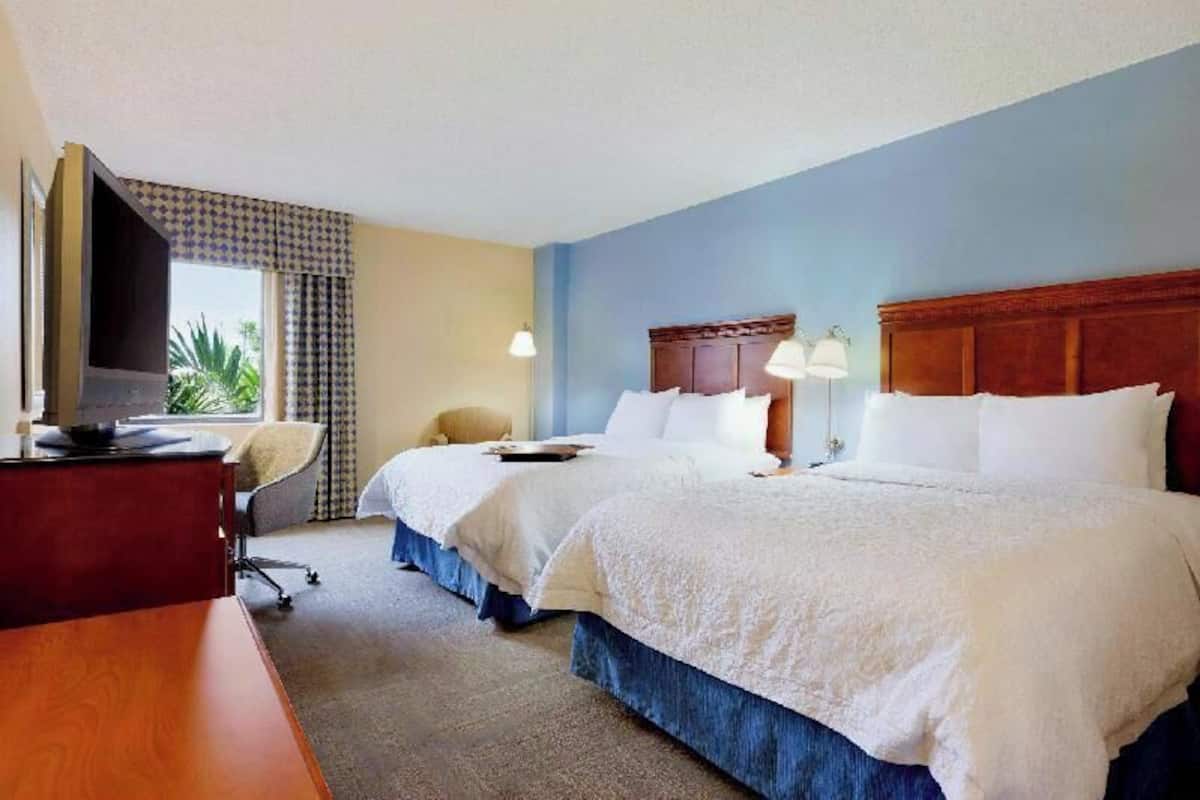 Premium bedding, pillowtop beds, desk, laptop workspace