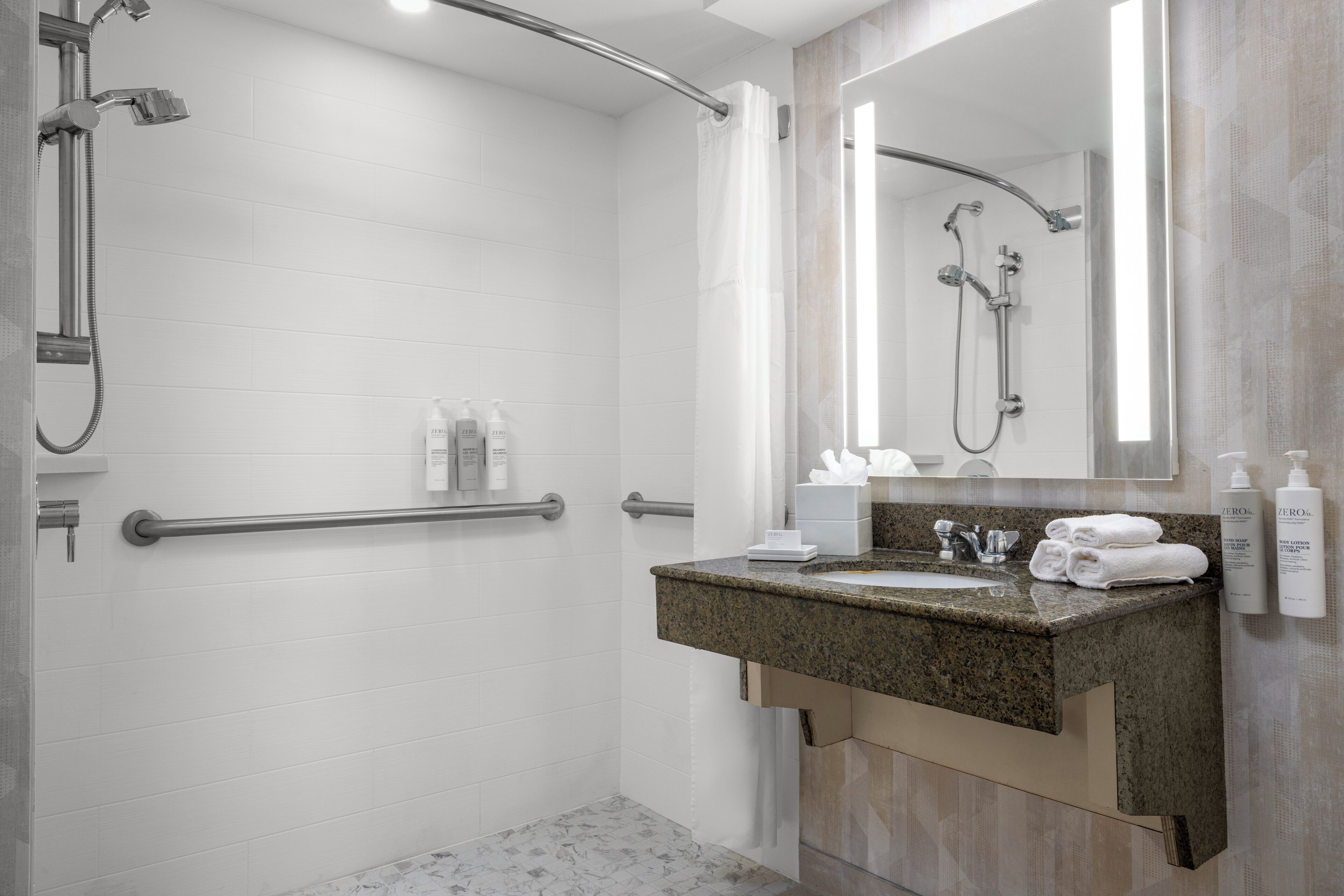 accessible room, 1 king bed (roll-in shower) | bathroom | combined shower/bathtub, eco-friendly toiletries, hair dryer, towels