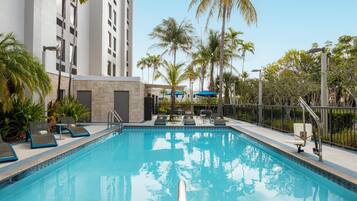 Outdoor pool, pool umbrellas, pool loungers