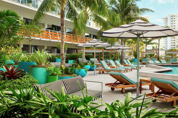 Outdoor pool, open 7:00 AM to 8:00 PM, cabanas (surcharge)