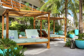 Outdoor pool, open 7:00 AM to 8:00 PM, cabanas (surcharge)