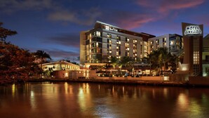 A multi-story hotel with a prominent sign reading "GATES" and "Motel Ankara" at night. - The Gates Hotel South Beach (Miami Beach)