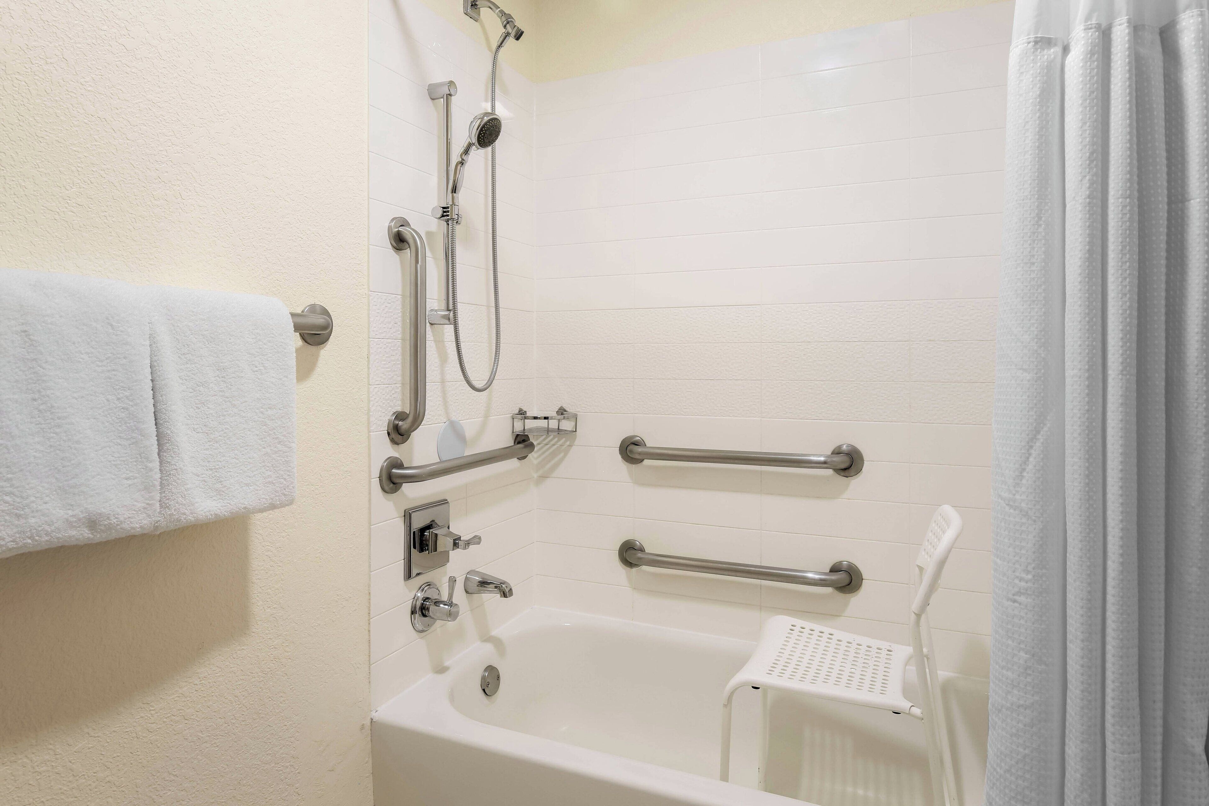 combined shower/bathtub, free toiletries, hair dryer, towels