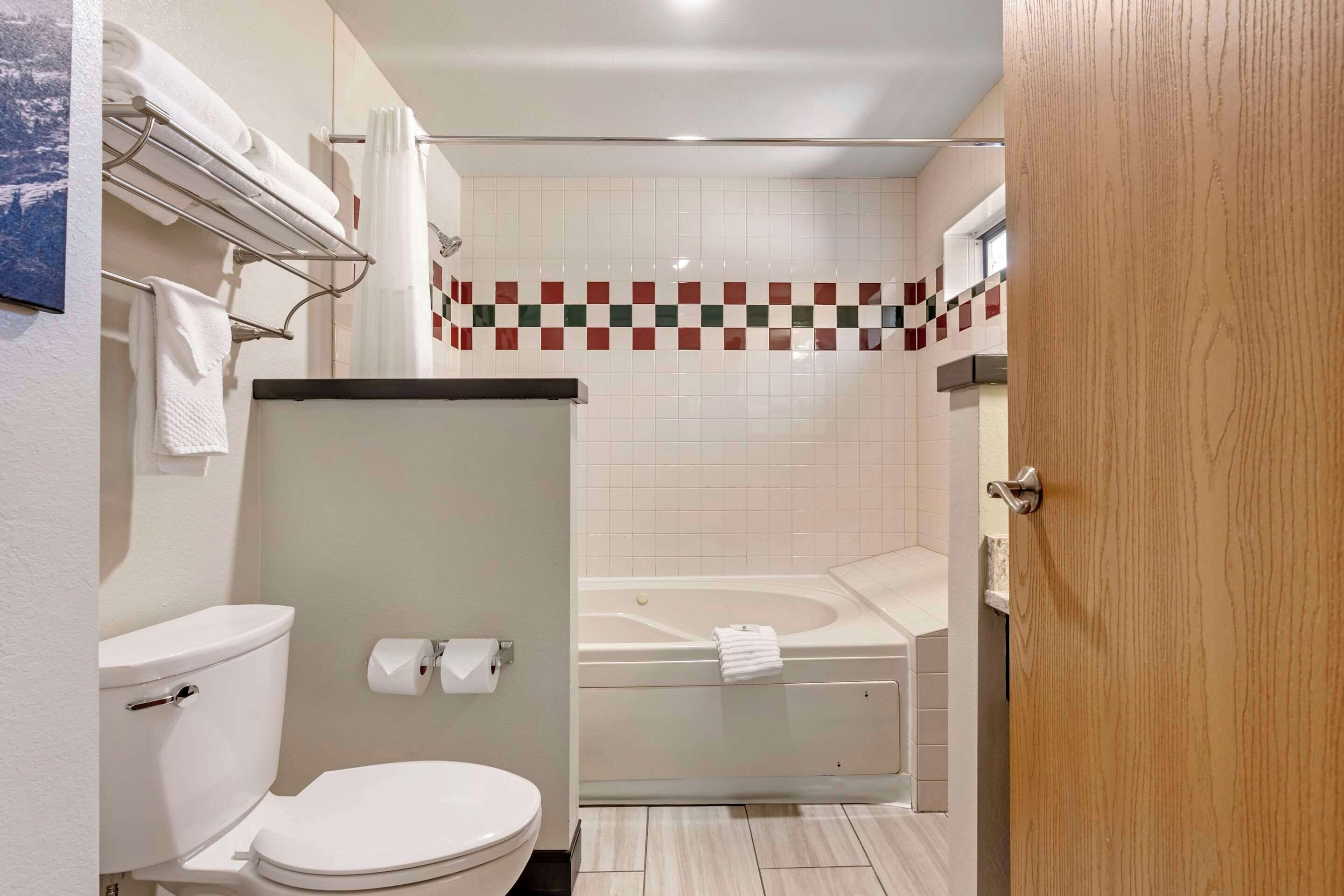 blackout curtains, iron/ironing board, bed sheets, alarm clocks