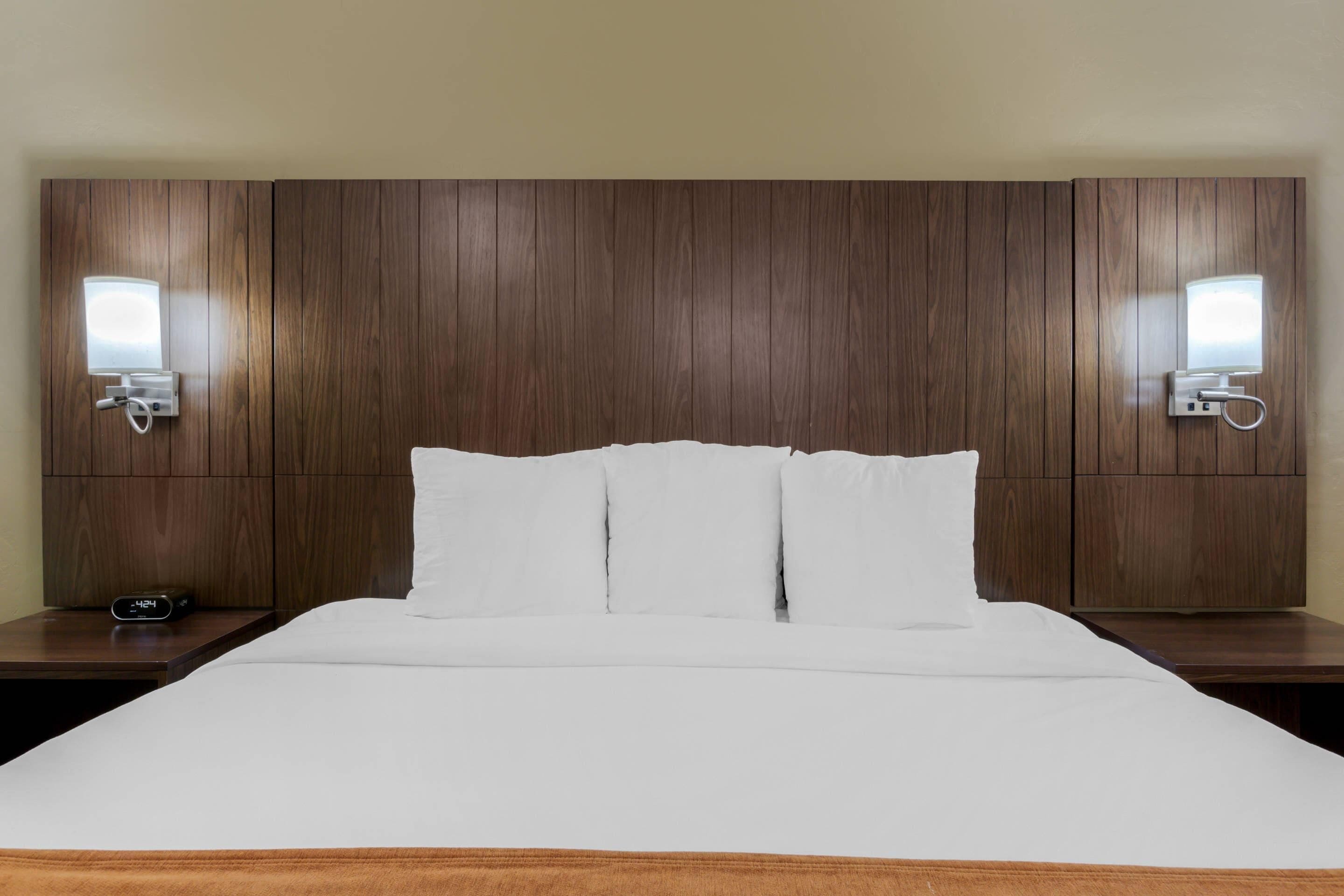 hypo-allergenic bedding, desk, blackout curtains, iron/ironing board