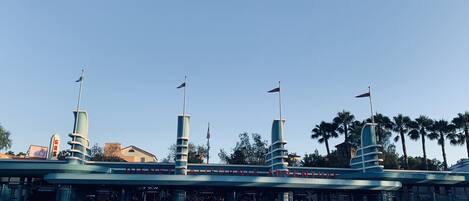 A large, open plaza with a prominent building labeled "DISNEY CALIFORNIA ADVENTURE".