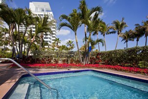 Outdoor pool, open 7:00 AM to 6:00 PM, sun loungers