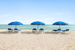 On the beach, beach towels