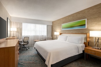 Hotel amenities such as safe, desk and work area at Holiday Inn Miami Beach - Oceanfront, an IHG Hotel