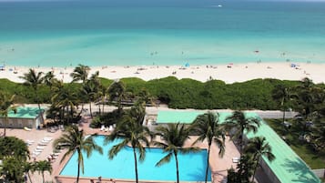 On the beach, sun loungers, beach umbrellas, beach towels