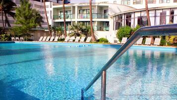 Indoor pool, outdoor pool, open 8 AM to 11 PM, pool cabanas (surcharge)