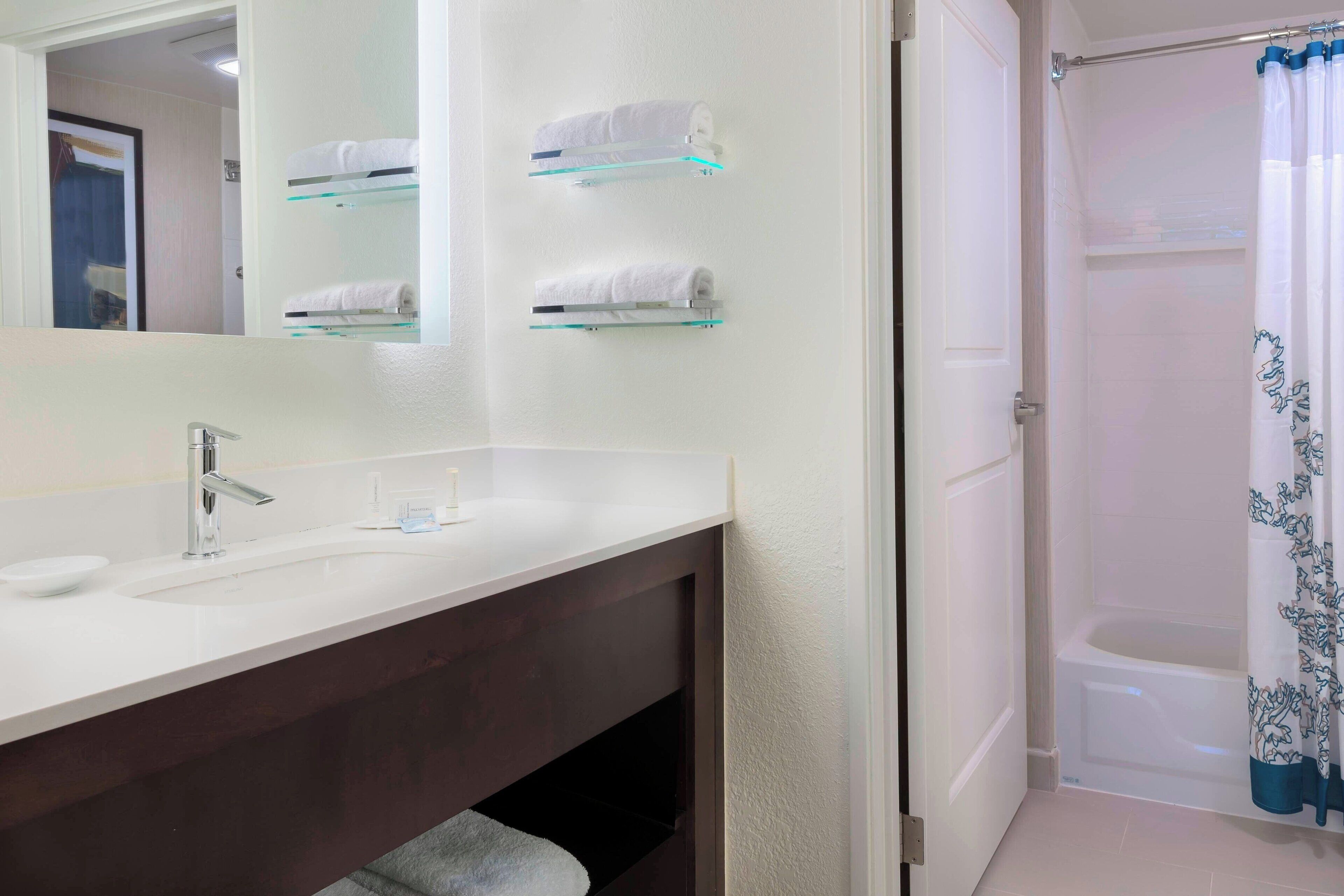 combined shower/bathtub, free toiletries, hair dryer, towels