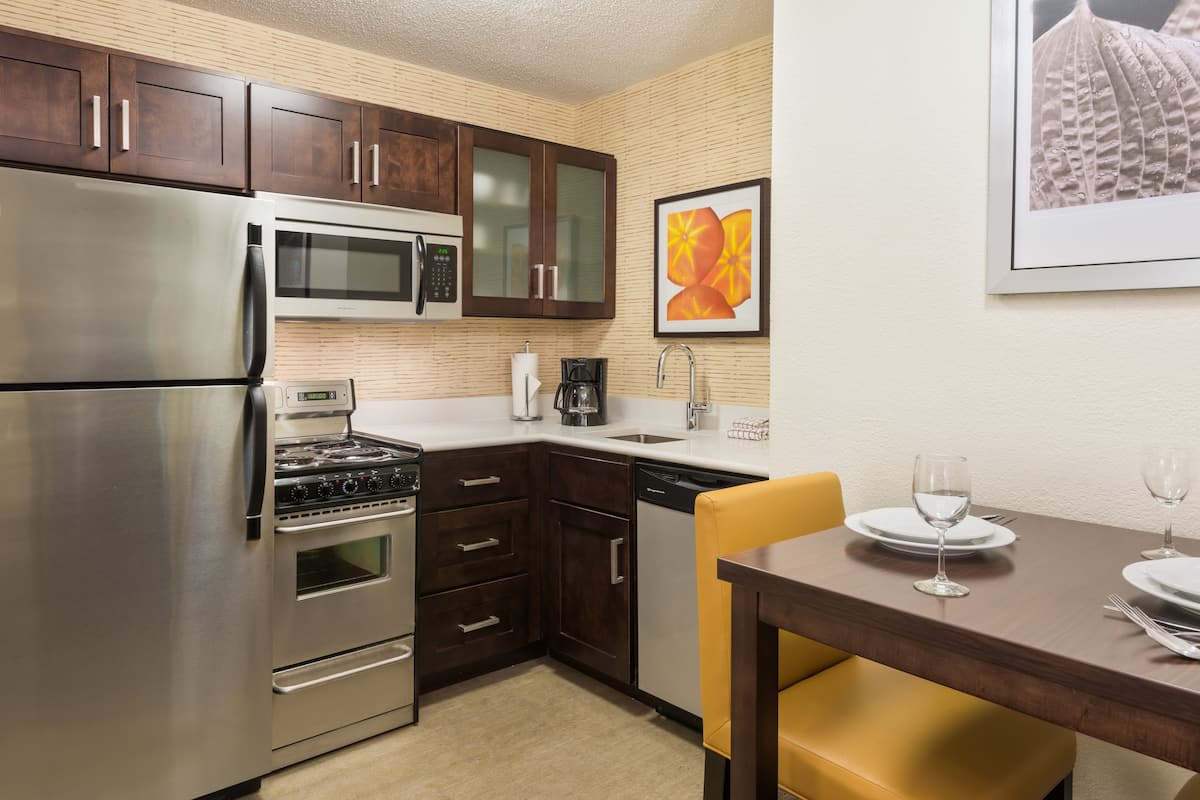 full-sized fridge, microwave, dishwasher, coffee/tea maker