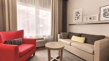 Desk, blackout drapes, iron/ironing board, free cribs/infant beds