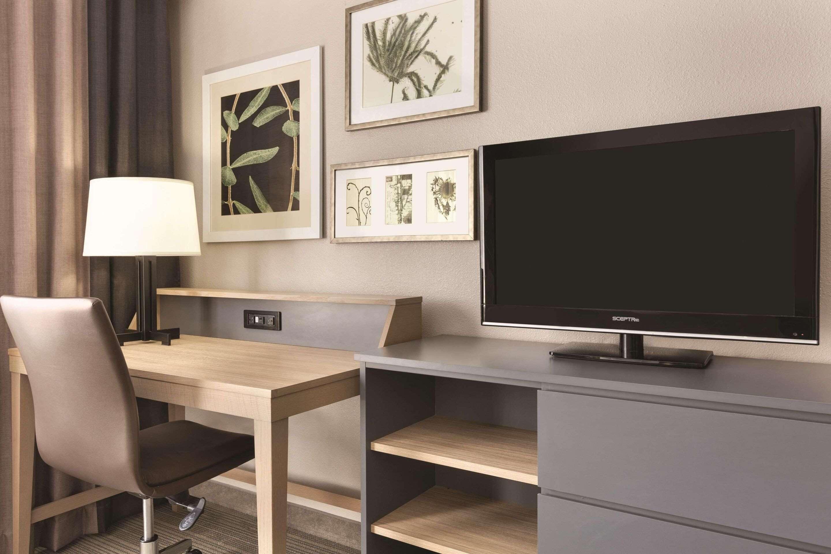 desk, blackout curtains, iron/ironing board, free cots/infant beds