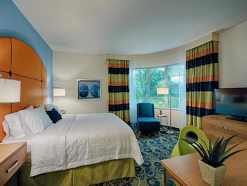 In-room safe, desk, laptop workspace, blackout drapes at Claremont Miami Beach