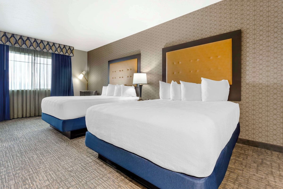 Hypo-allergenic bedding, pillow-top beds, in-room safe, desk