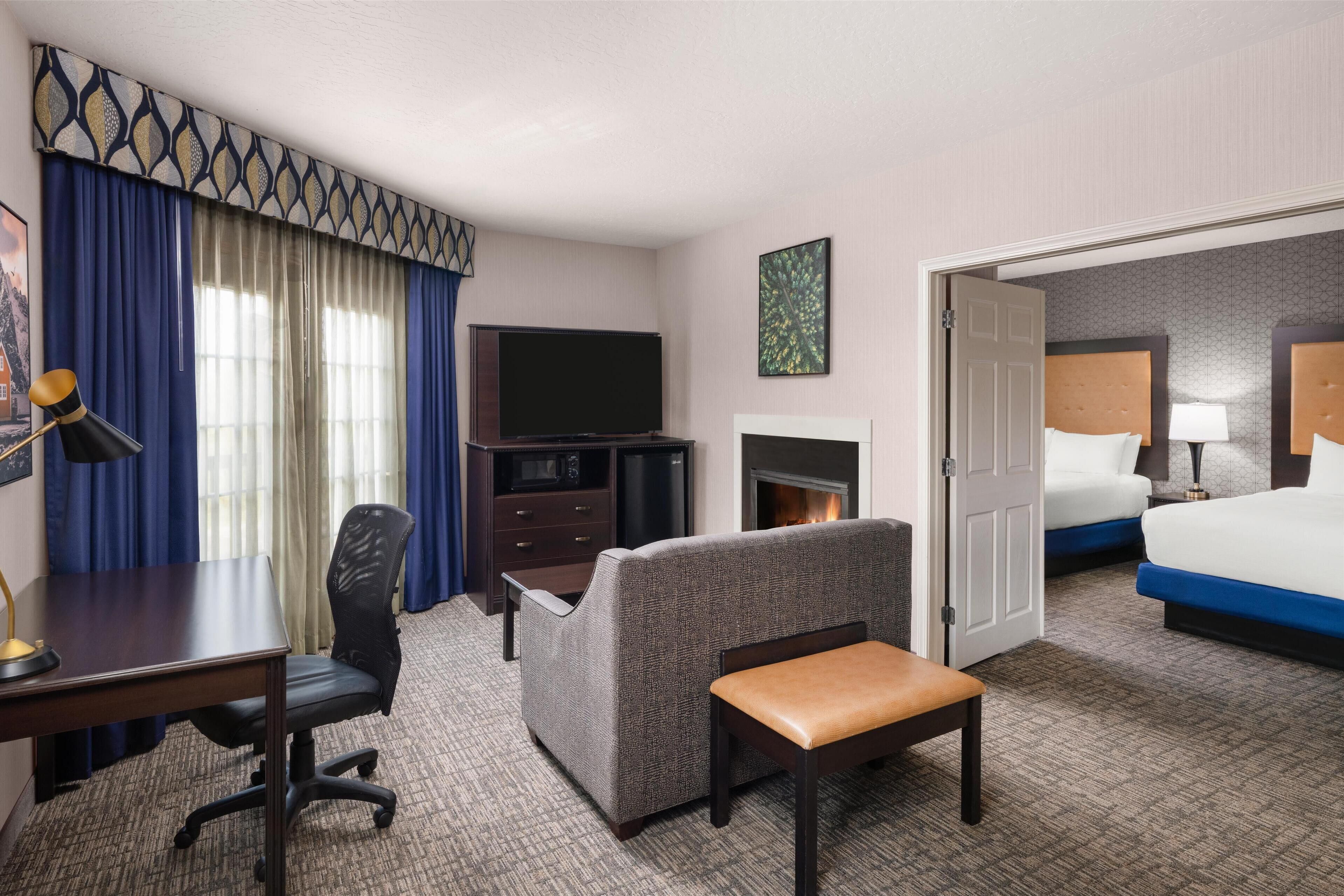 Suite, 2 Queen Beds, Non Smoking, Fireplace | Hypo-allergenic bedding available, pillowtop beds, in-room safe, desk