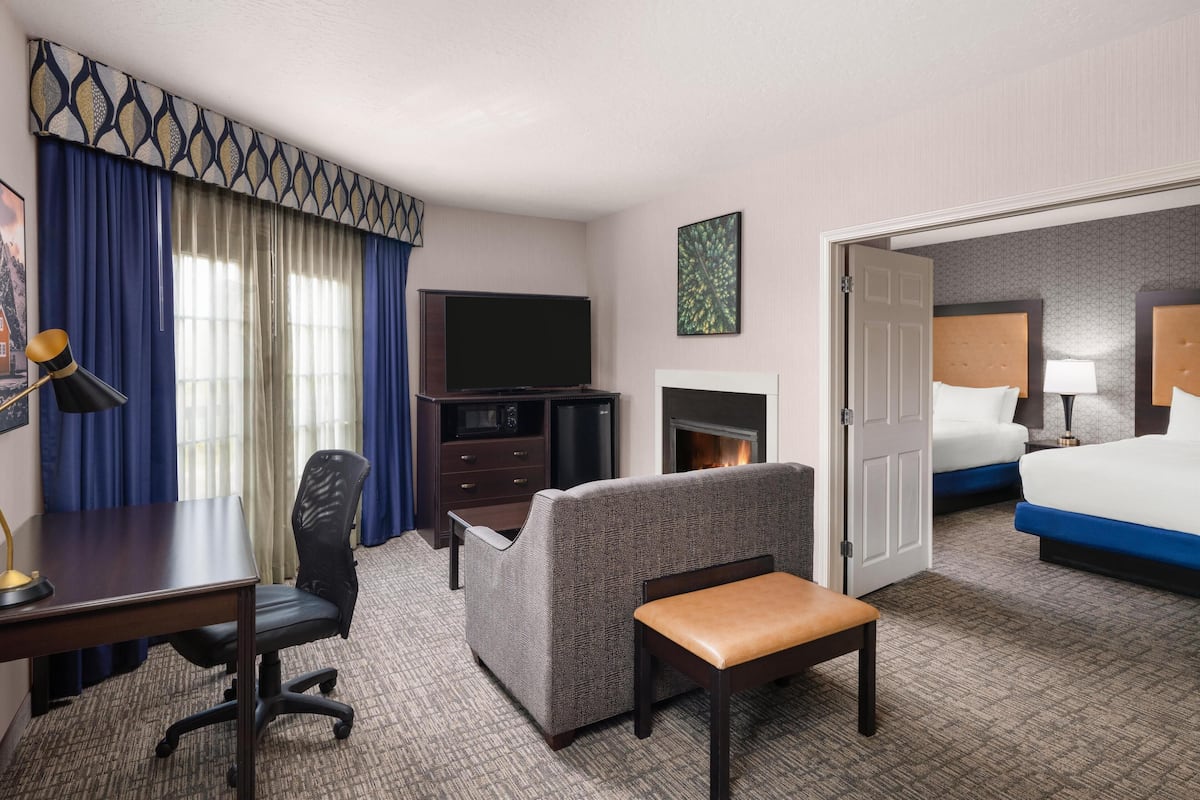Suite, 2 Queen Beds, Non Smoking, Fireplace | Hypo-allergenic bedding available, pillowtop beds, in-room safe, desk