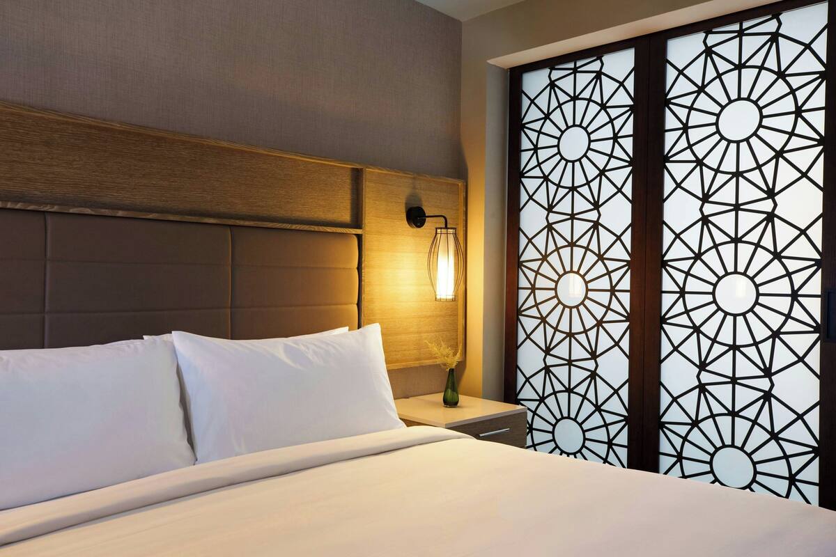 premium bedding, desk, blackout curtains, soundproofing