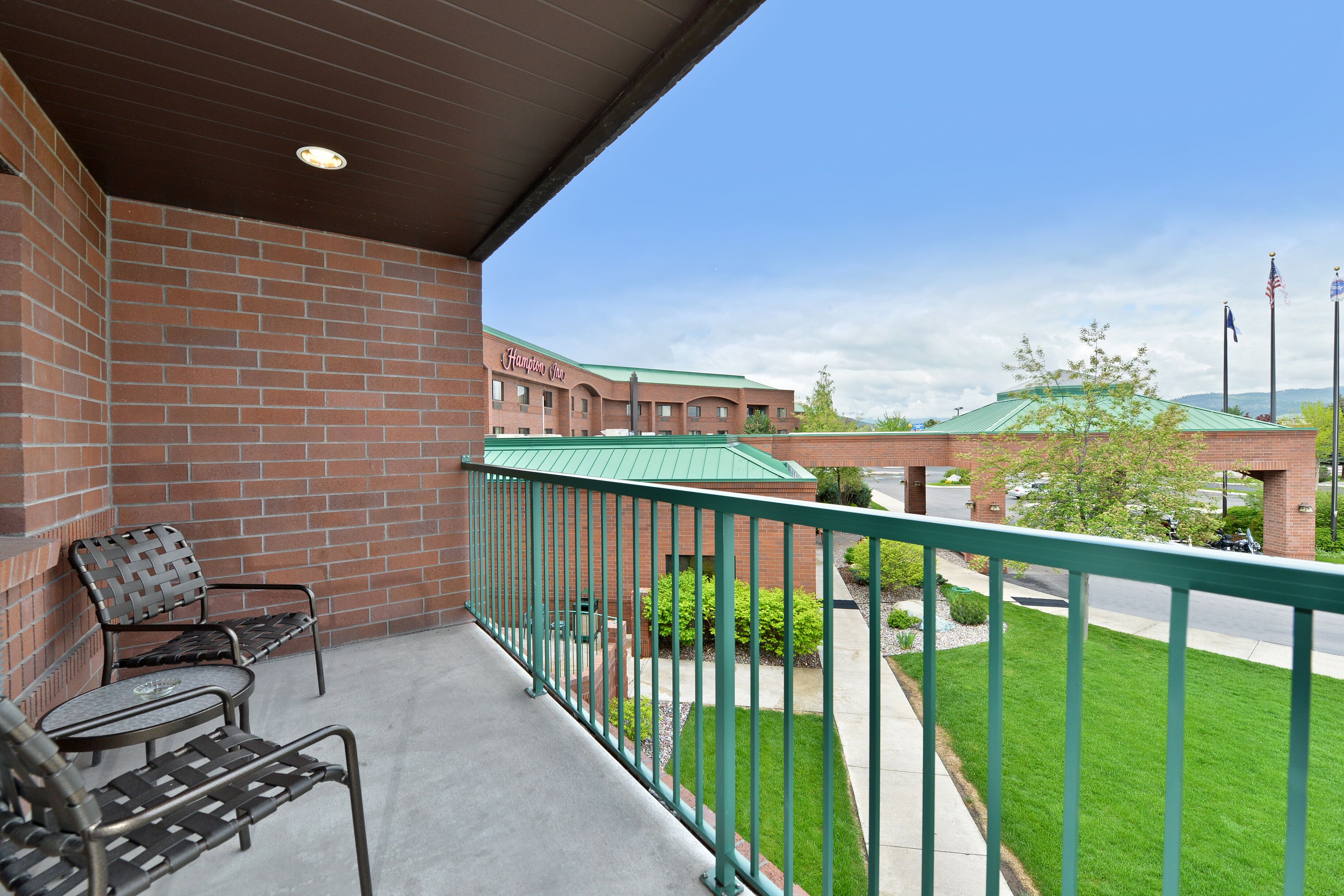 suite, 2 queen beds, non smoking, fireplace | balcony view