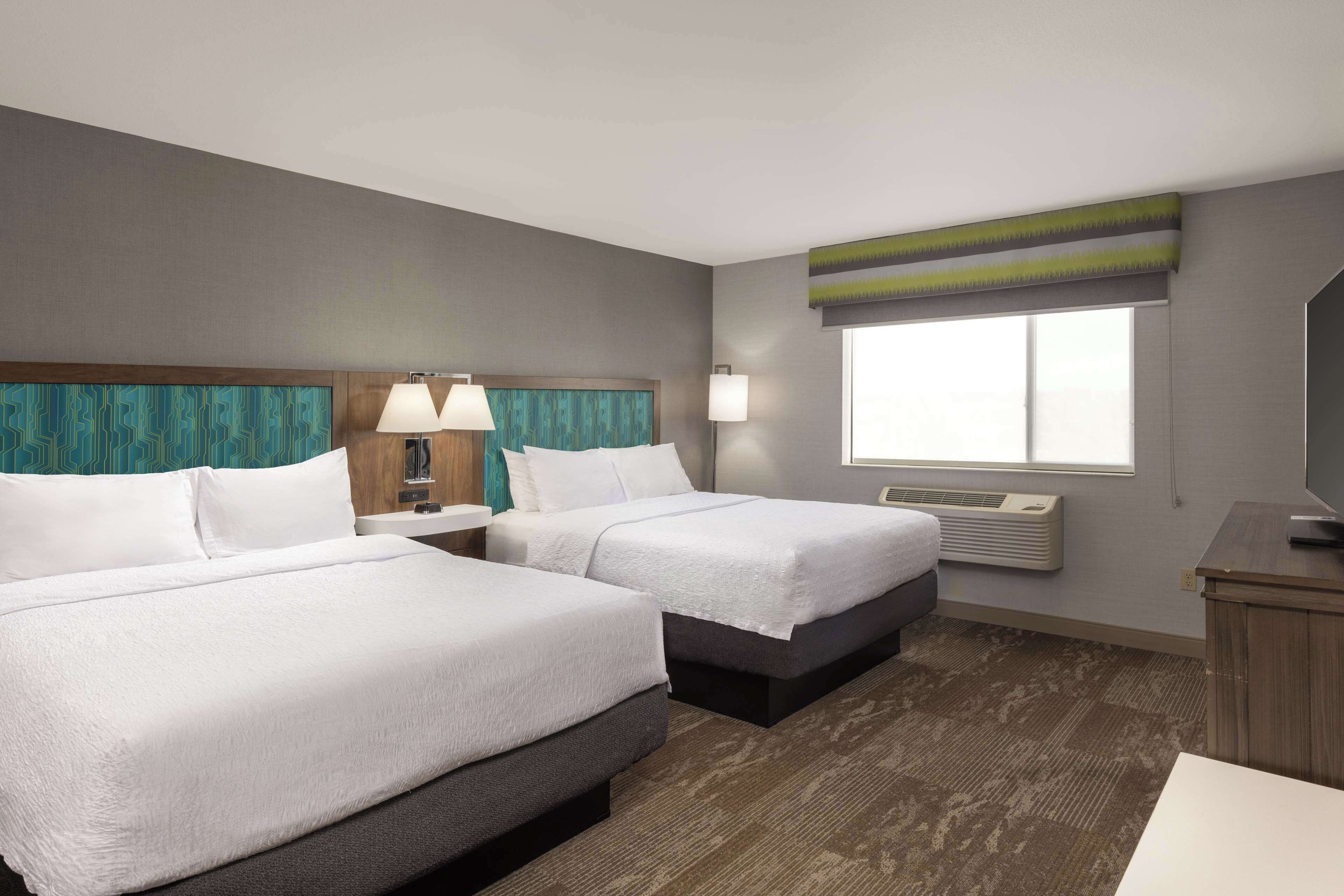 suite, 2 queen beds, non smoking, fireplace | premium bedding, in-room safe, desk, iron/ironing board