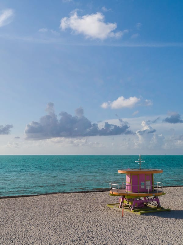 Beach nearby, white sand, sun loungers, beach towels