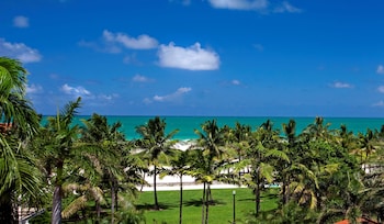 Beach nearby, white sand, sun loungers, beach towels at Dream South Beach, by Hyatt