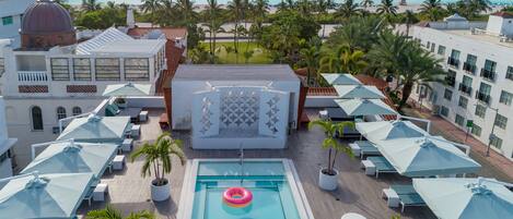 Outdoor pool, open 9:00 AM to 5:30 PM, pool umbrellas, sun loungers