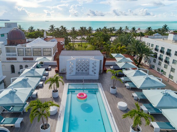Outdoor pool, open 9:00 AM to 5:30 PM, pool umbrellas, sun loungers