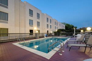 Outdoor pool, open 11:00 AM to 8:00 PM, pool umbrellas, sun loungers