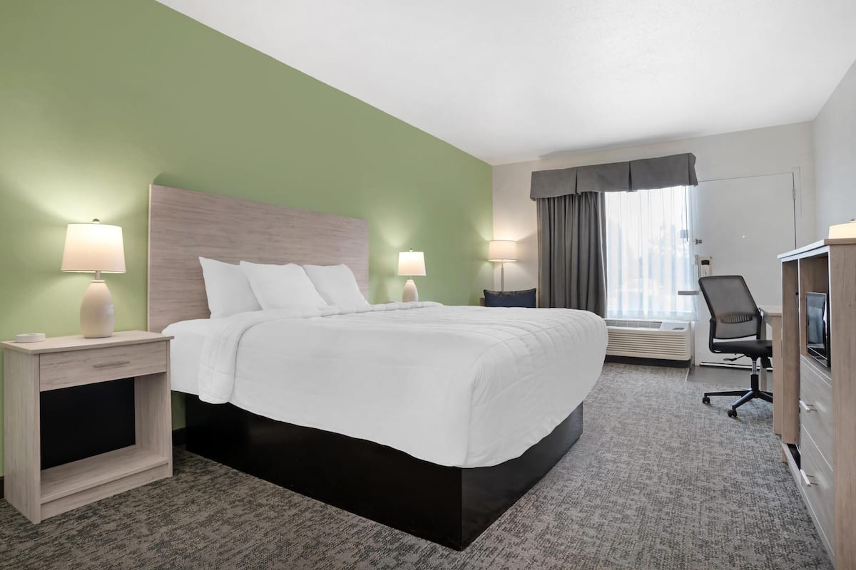 Premium bedding, memory-foam beds, desk, laptop workspace