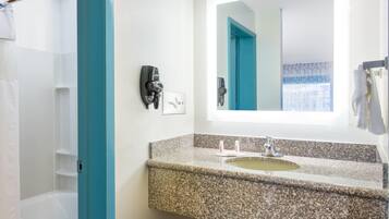 Shower, eco-friendly toiletries, hair dryer, towels