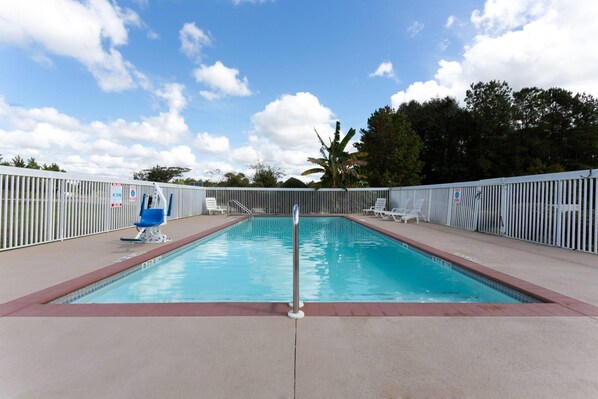 Seasonal outdoor pool, open 8:30 AM to 9:30 PM, pool umbrellas