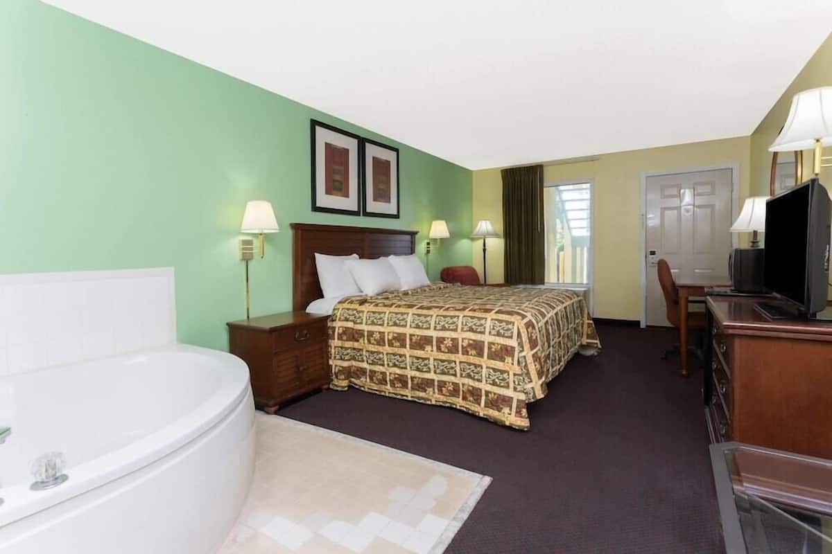 1 bedroom, desk, blackout drapes, iron/ironing board