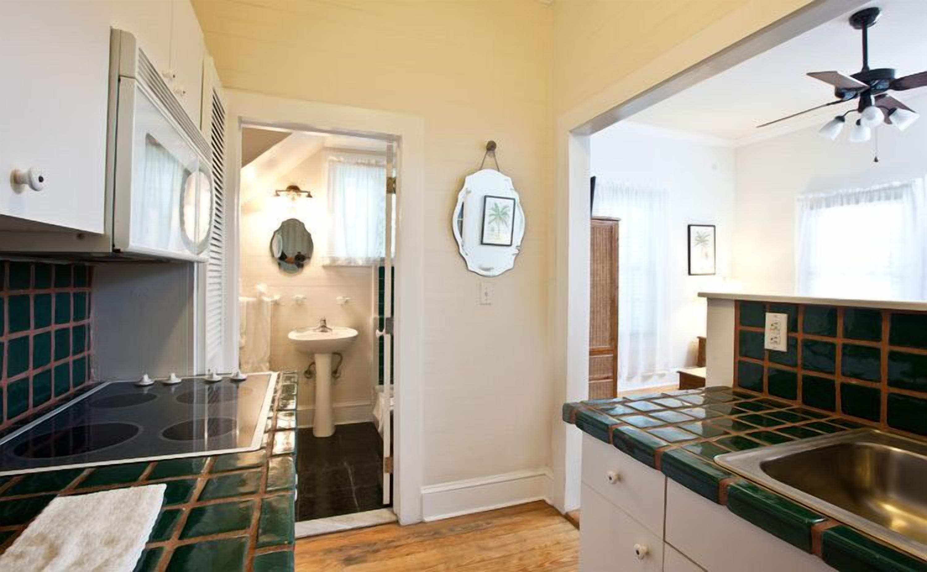 arch house 2 bedroom suite  | private kitchen | full-sized fridge, microwave, stovetop, coffee/tea maker