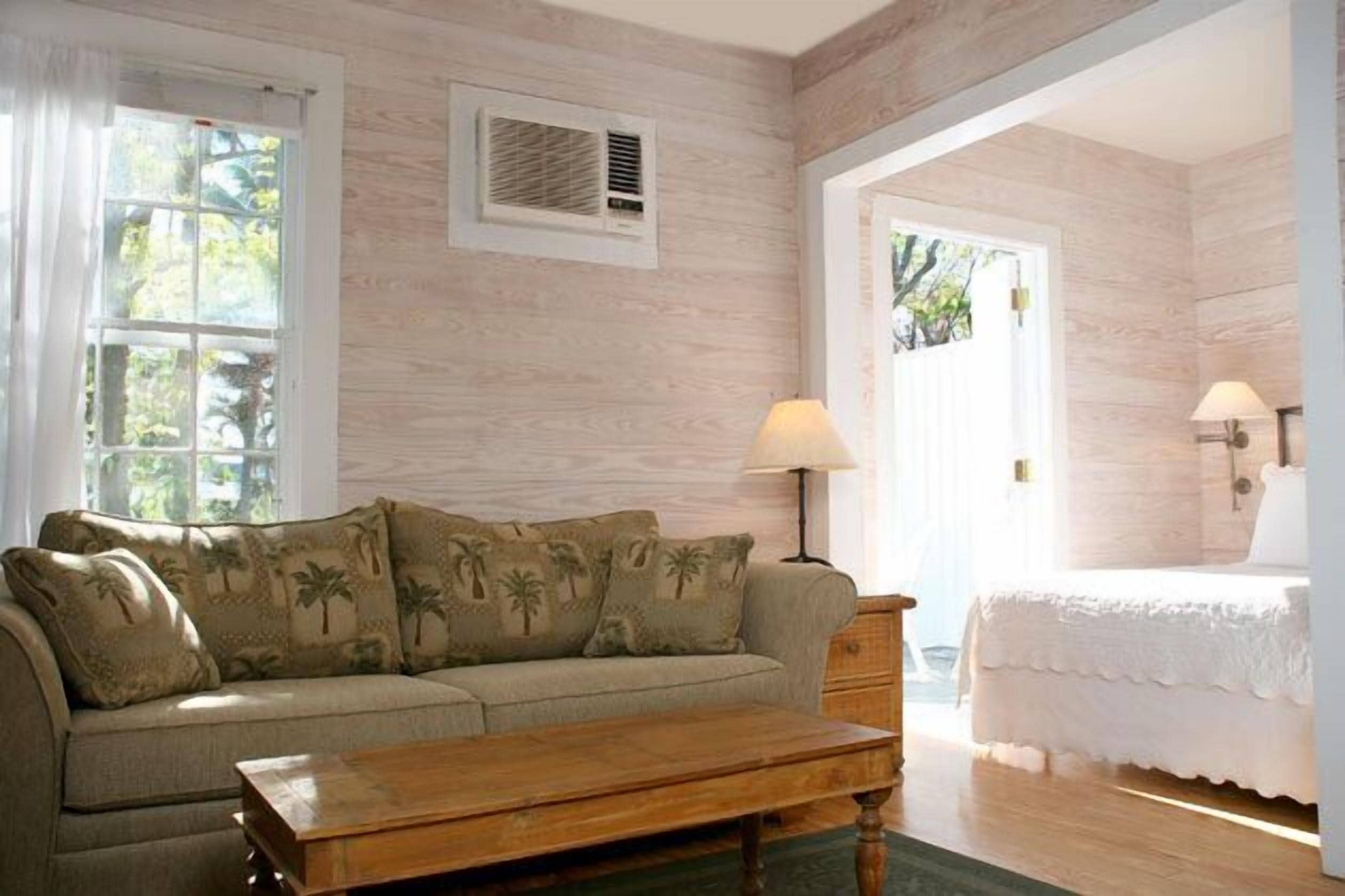 arch house garden view studio w/ balcony | living area | tv