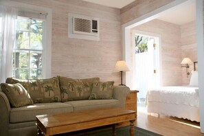 Arch House Garden View Studio w/ Balcony | Living area | TV - Island City House Hotel (Key West)